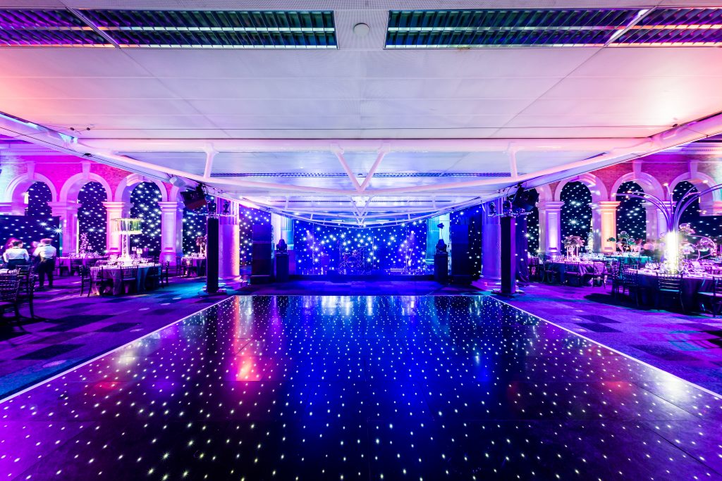 contemporary summer party them led light up dance floor star-cloth draping pink and blue lighting