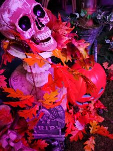 Halloween themed event with skeletons and autumn leaves