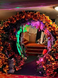 Halloween themed tunnel with skeletons, pumpkins and autumn leaves