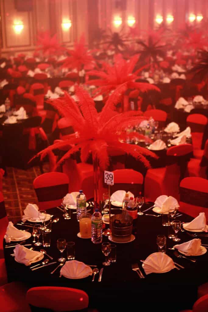 Eventologists Burlesque Themed Event Red Feather Table Centre Hire