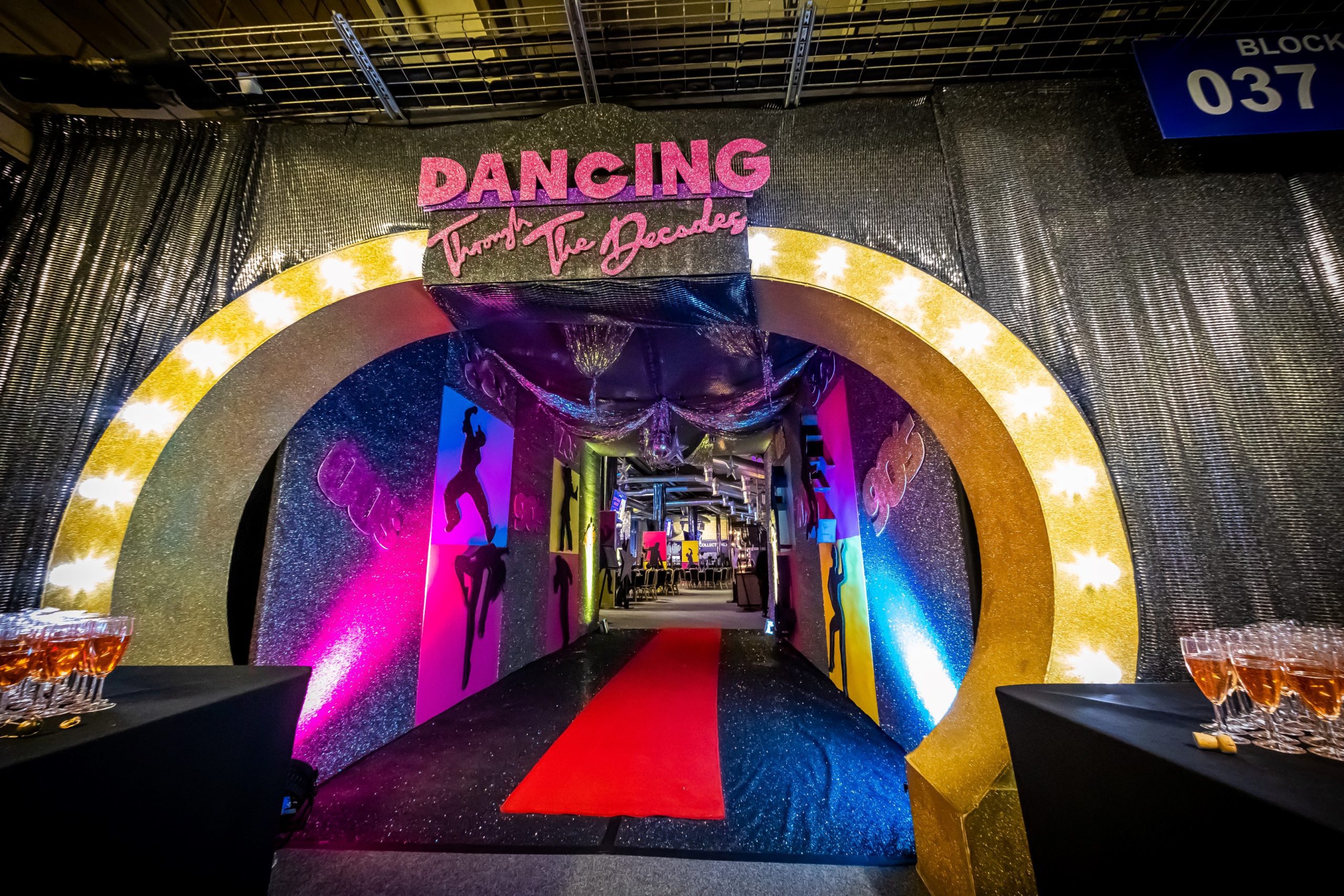 Eventologists Dancing Through The Decades Themed Event Glitter Draping Gold Entrance Glam Entrance Hire