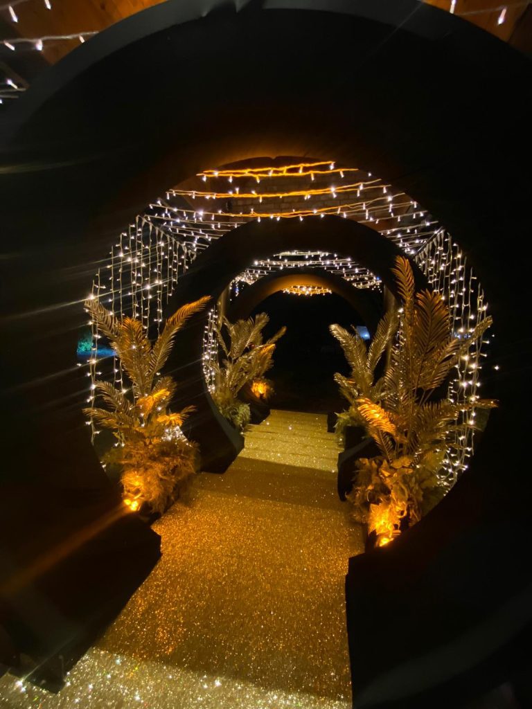 Eventologists Glam And Glitz Themed Event Black And Gold Tunnel Fairylight Ceiling Dressing Hire