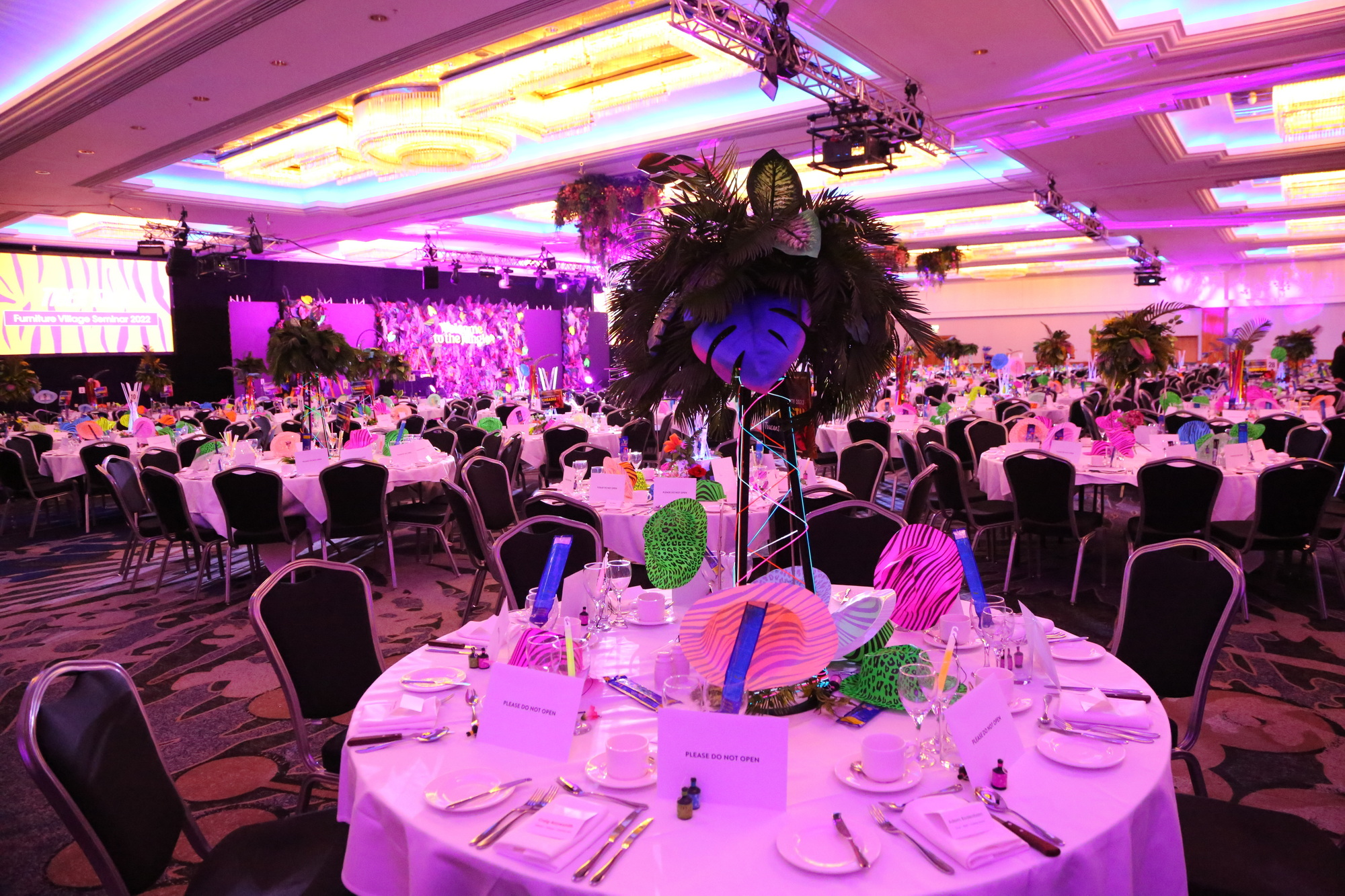 Eventologists Neon Jungle Themed Event Foliage Neon Table Centre Hire