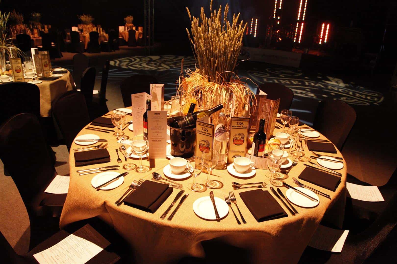 Eventologists Wild West Themed Event Tall Wheat Table Centre Hire