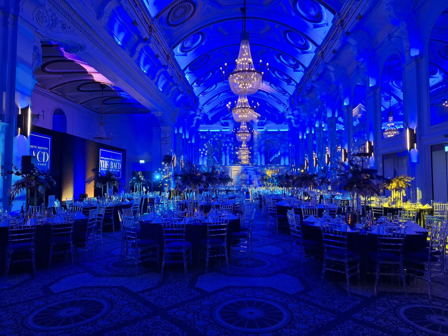 large scale event production with themed table centres and decorations