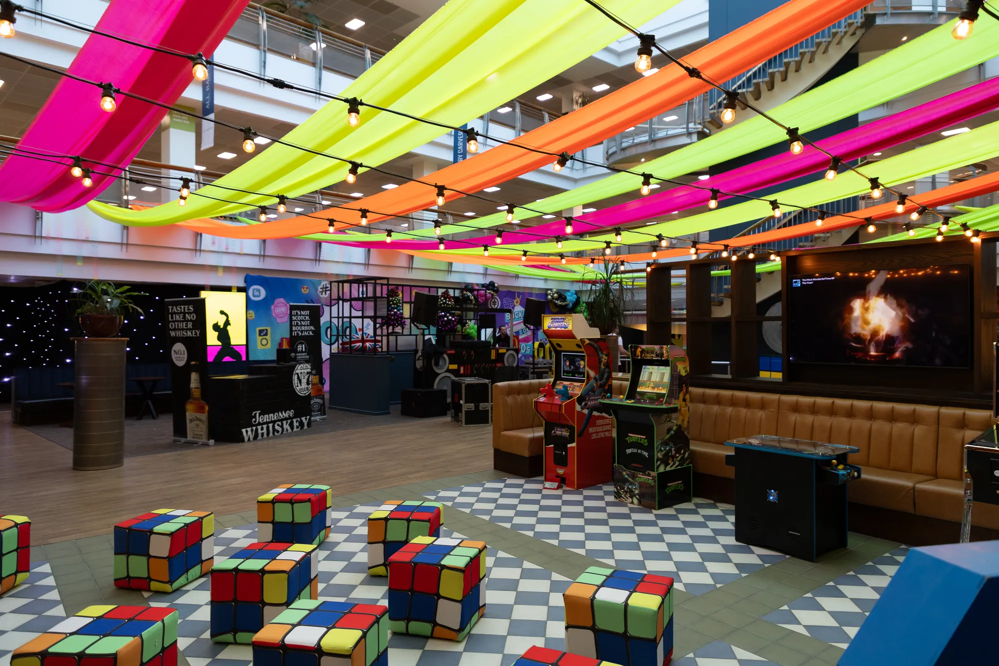 Retro Arcade Games & Rubik's Cube Seating Area