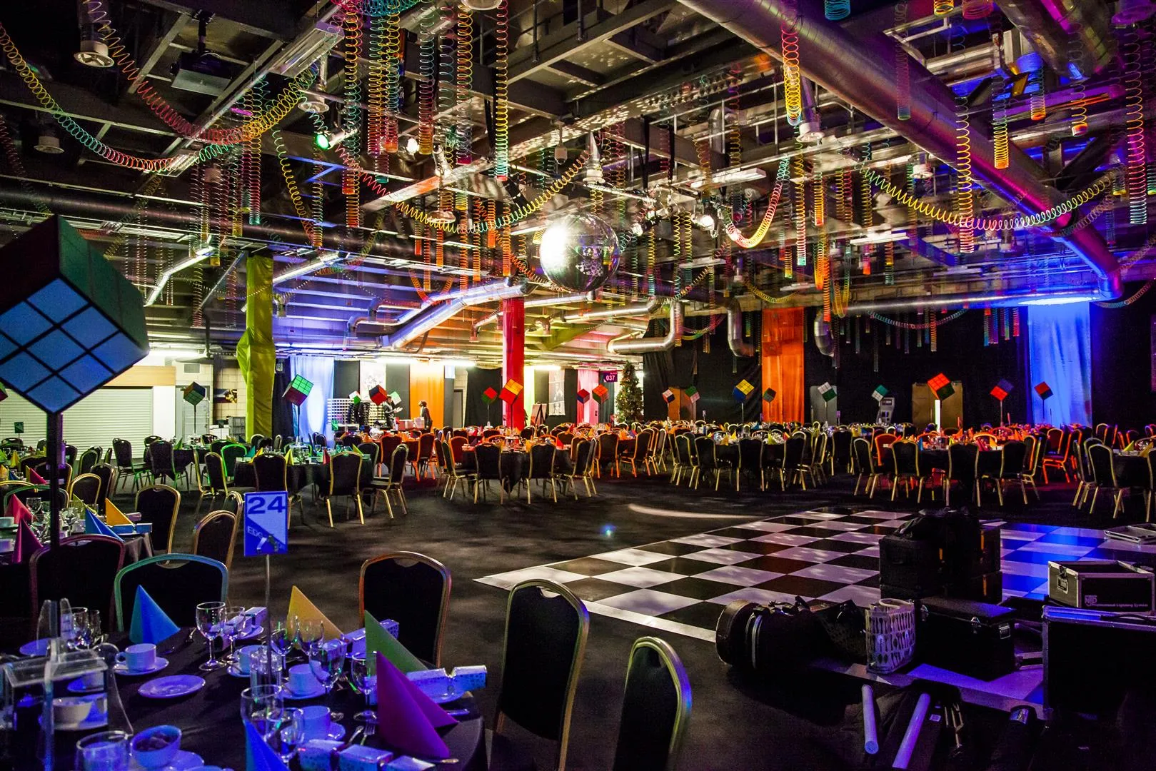 Hanging Slinky Ceiling Over Checkerboard Dance Floor