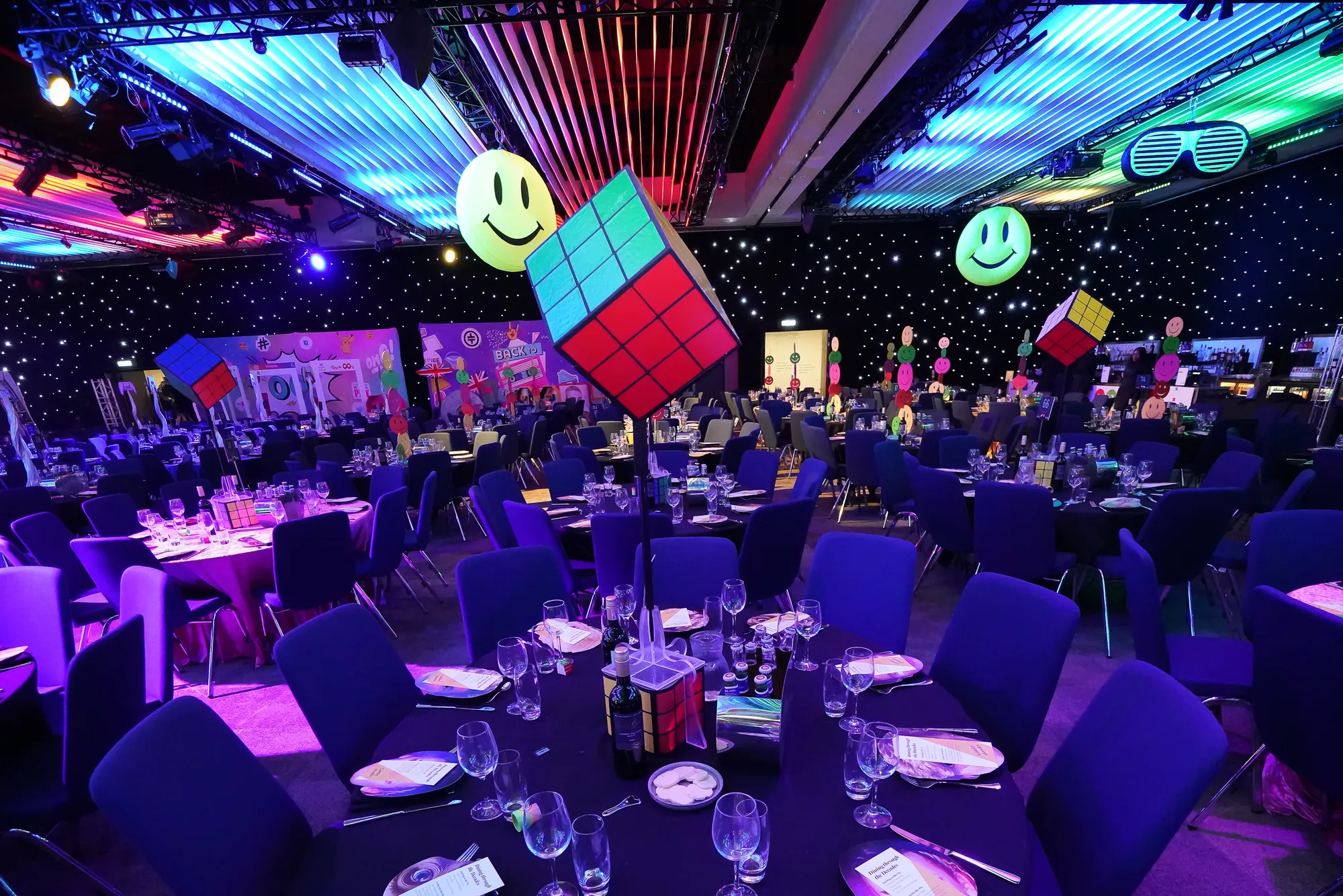 Rubik's Cube Centrepiece with Giant Smiley Balloons