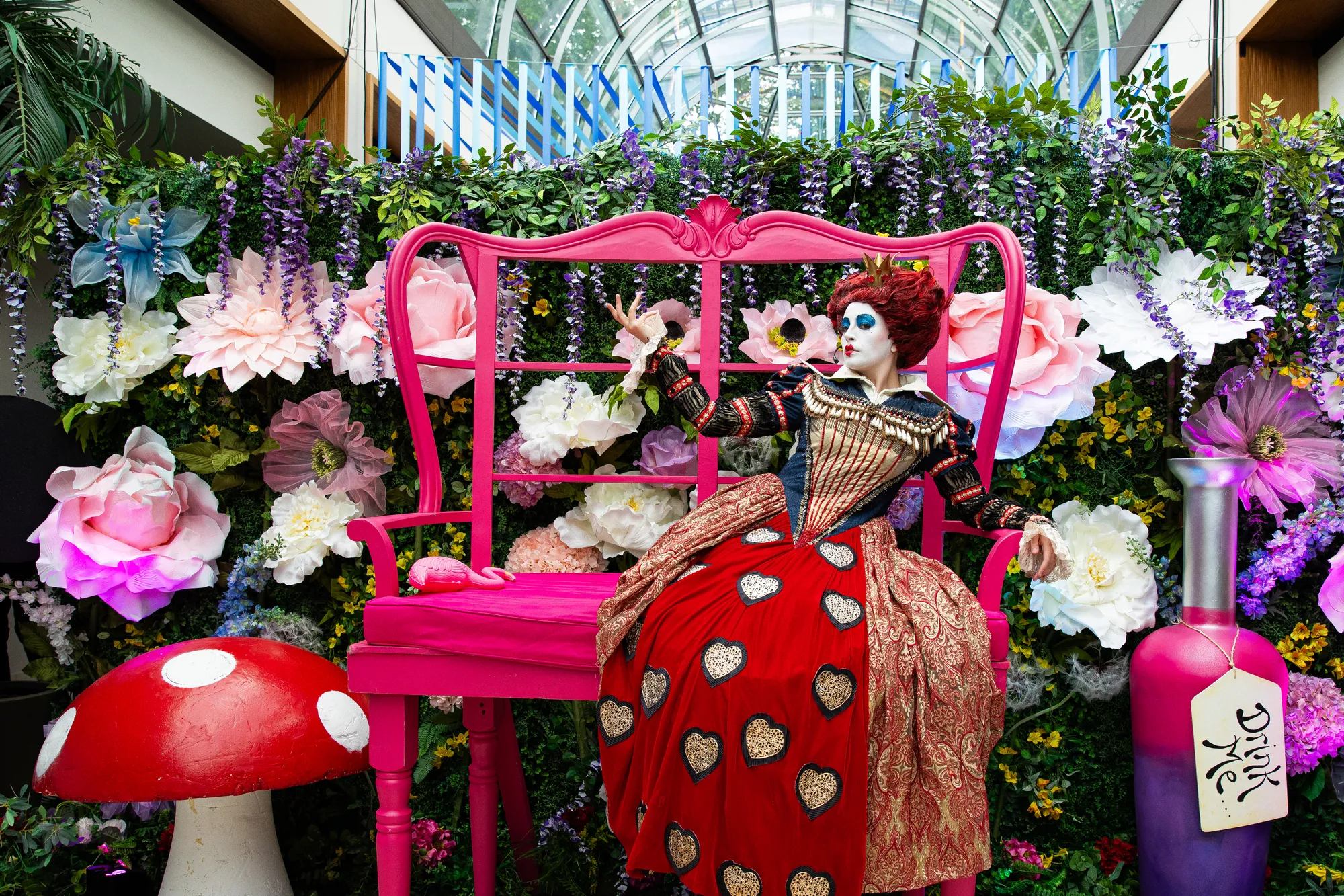 Queen of Hearts on an Oversized Pink Throne