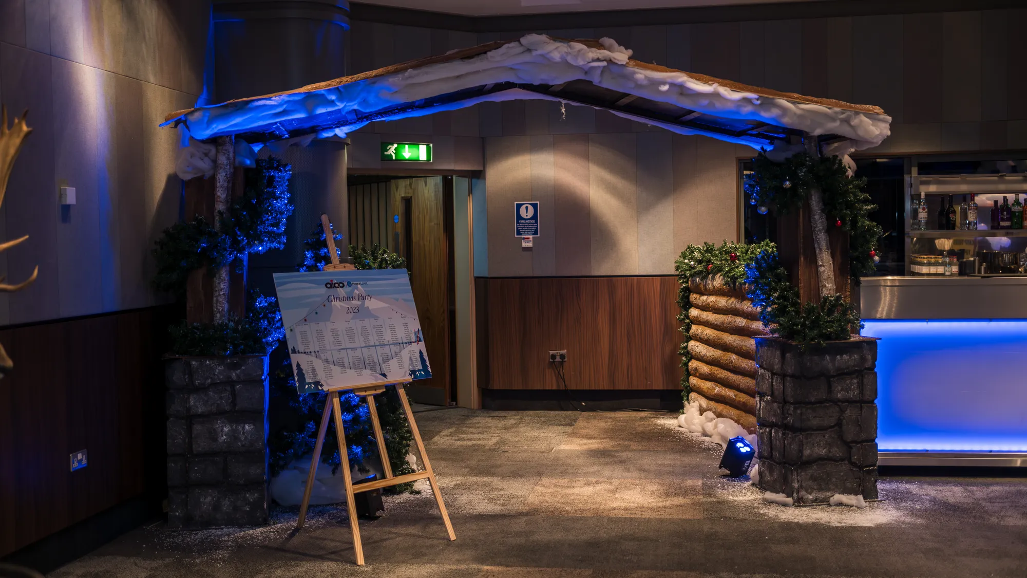 Snow-Capped Chalet Archway with Log Cabin Wall