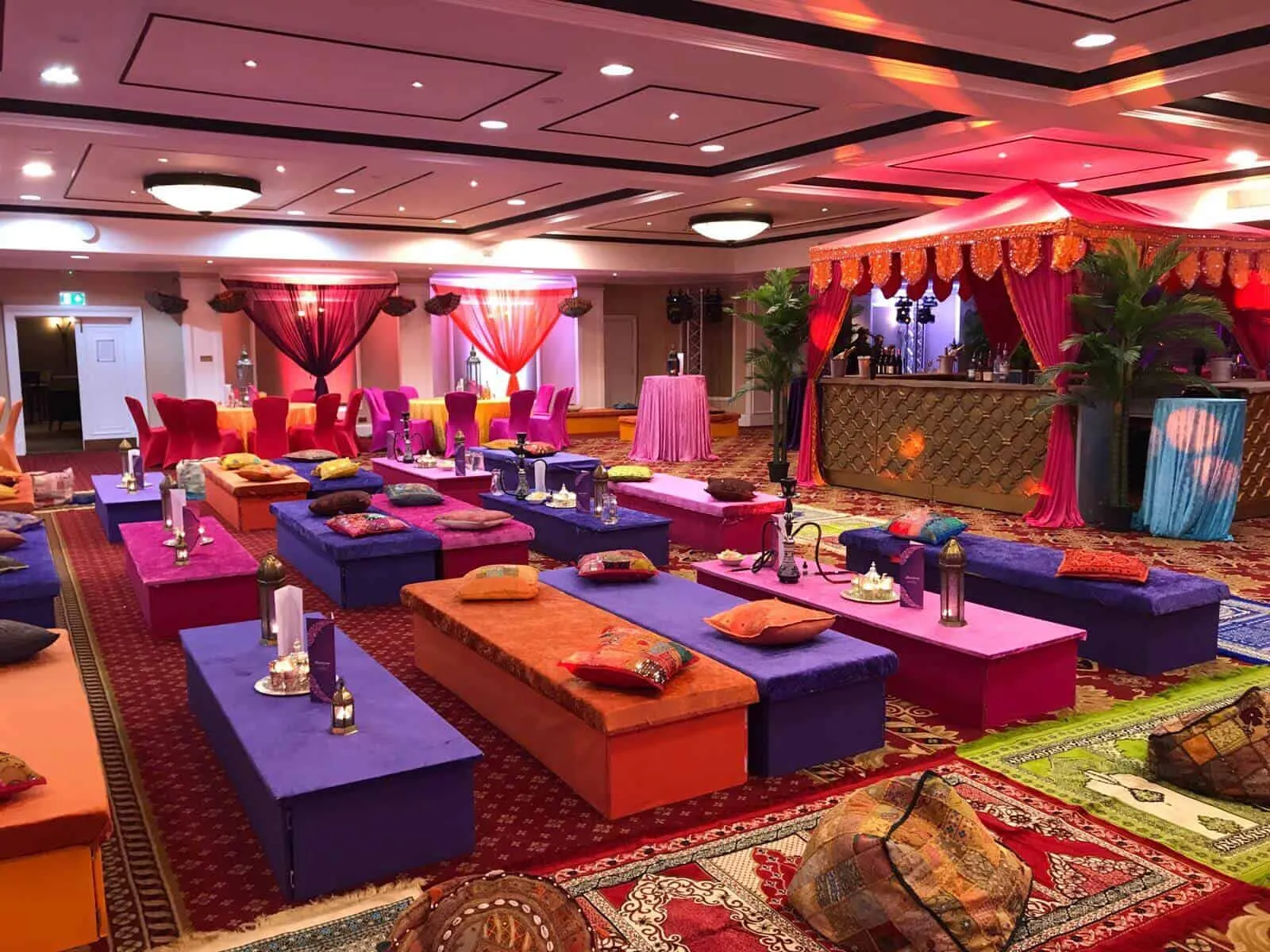 Majlis Lounge Facing a Moroccan-Fronted Bar