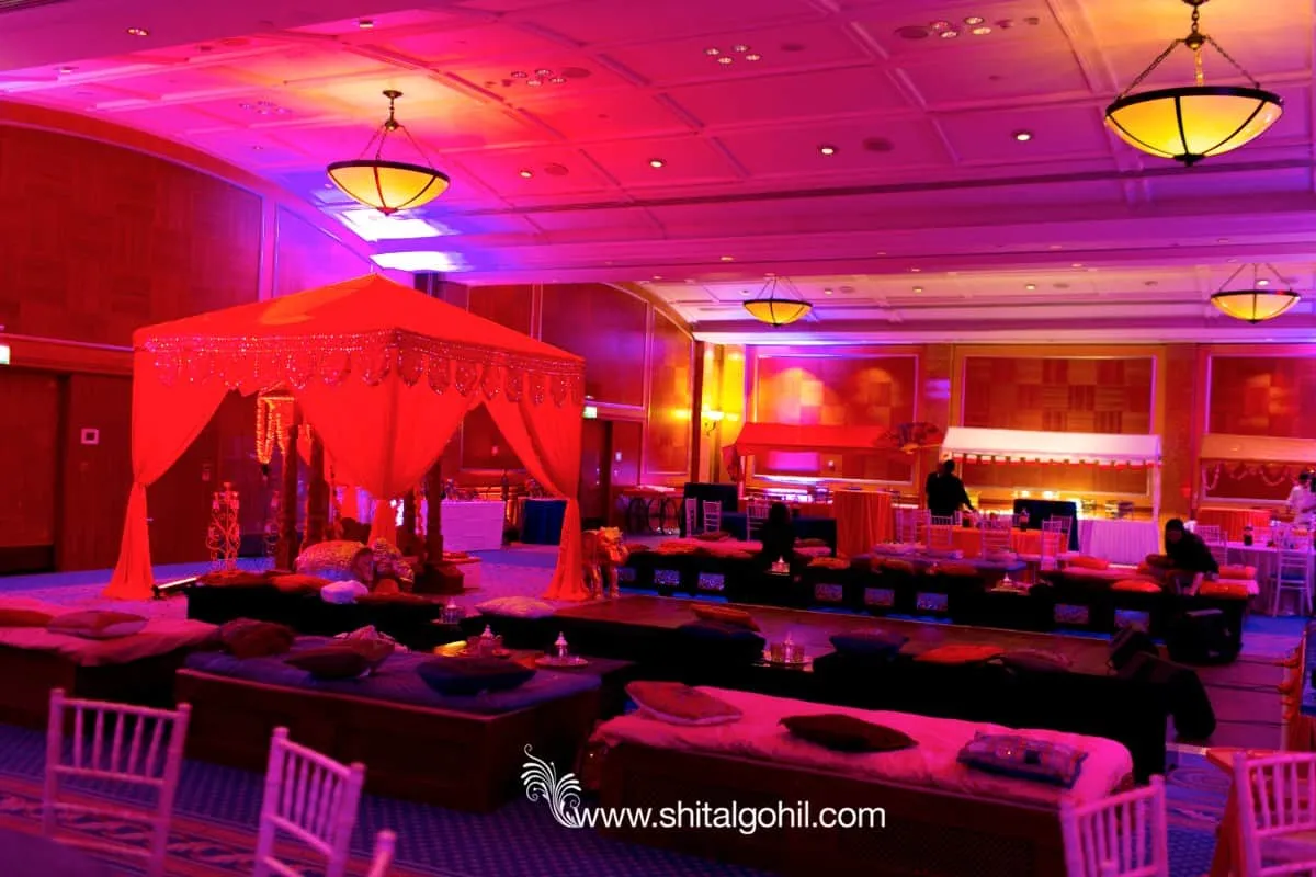 Red Silk Canopy Over Low Lounge Seating